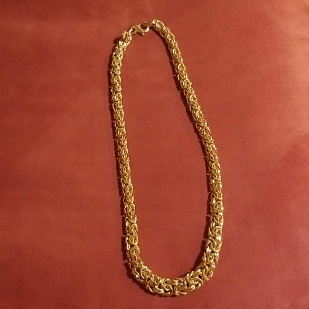 Womens gold colored Dyadema bronze necklace